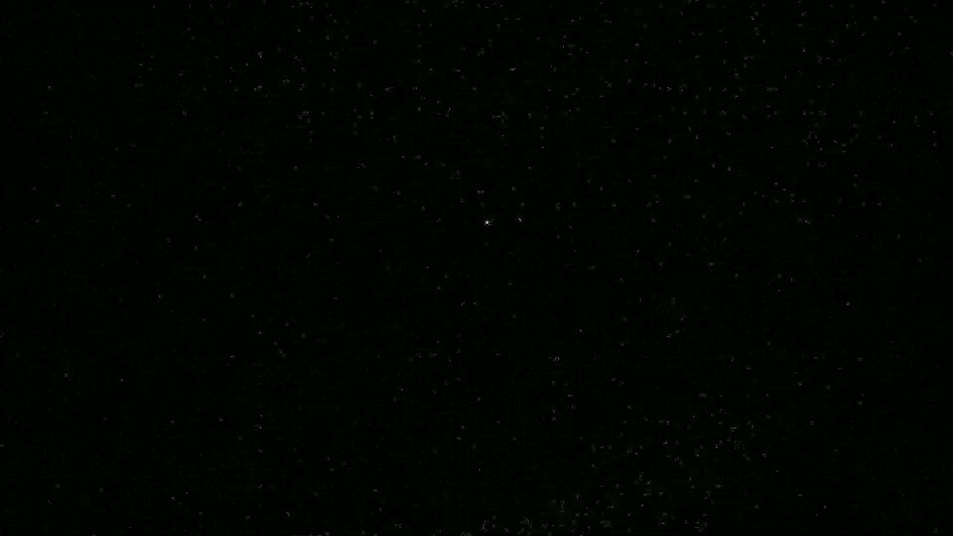 A dark, night sky is speckled with numerous tiny stars, with one slightly brighter star near the center.