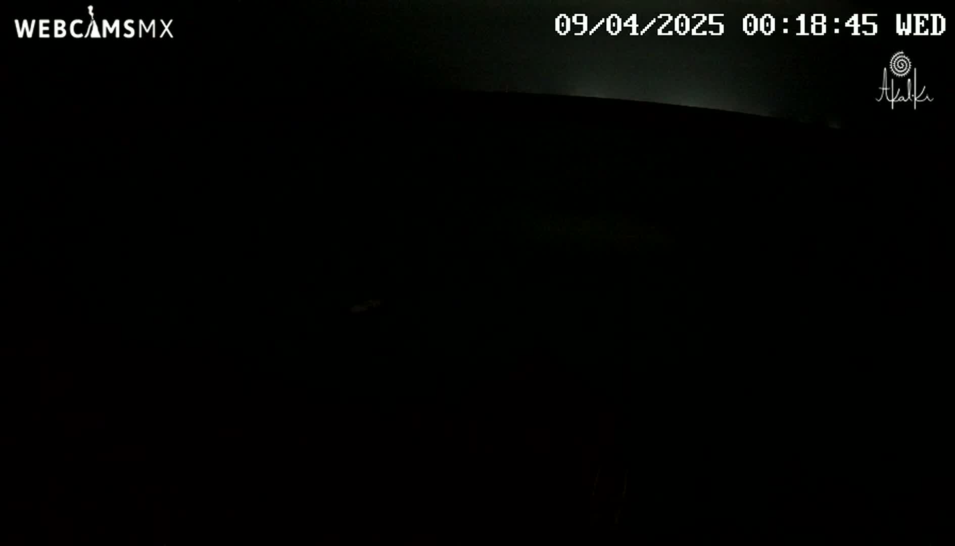 The image shows a completely dark scene at night.