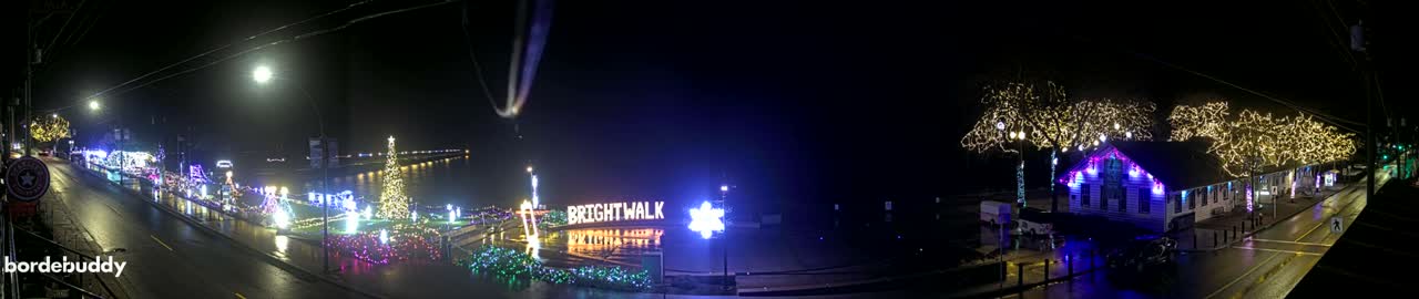 The image displays a dark, almost entirely black background with a subtle, mottled texture.