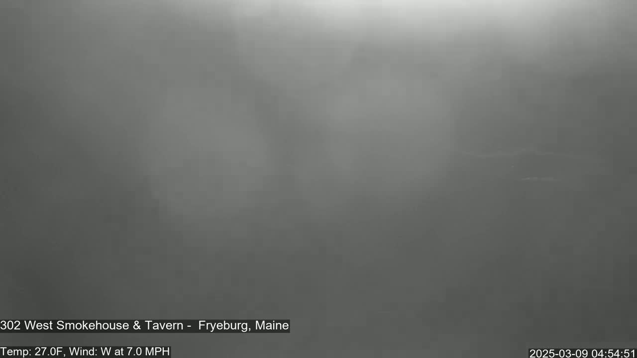 A foggy, gray outdoor scene with a temperature of 27 degrees Fahrenheit and a westerly wind of 7 miles per hour.