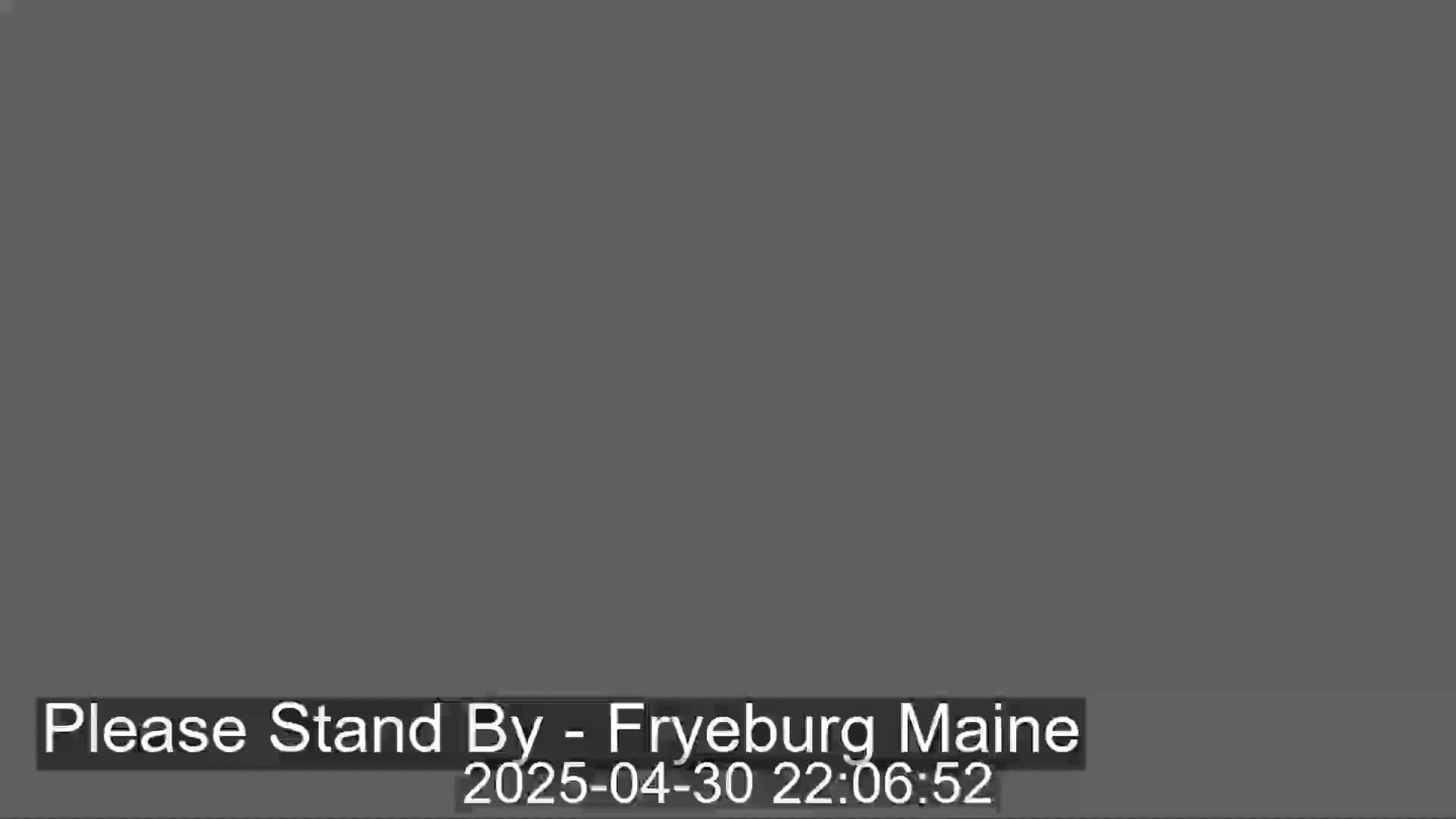 A solid dark gray screen is displayed.