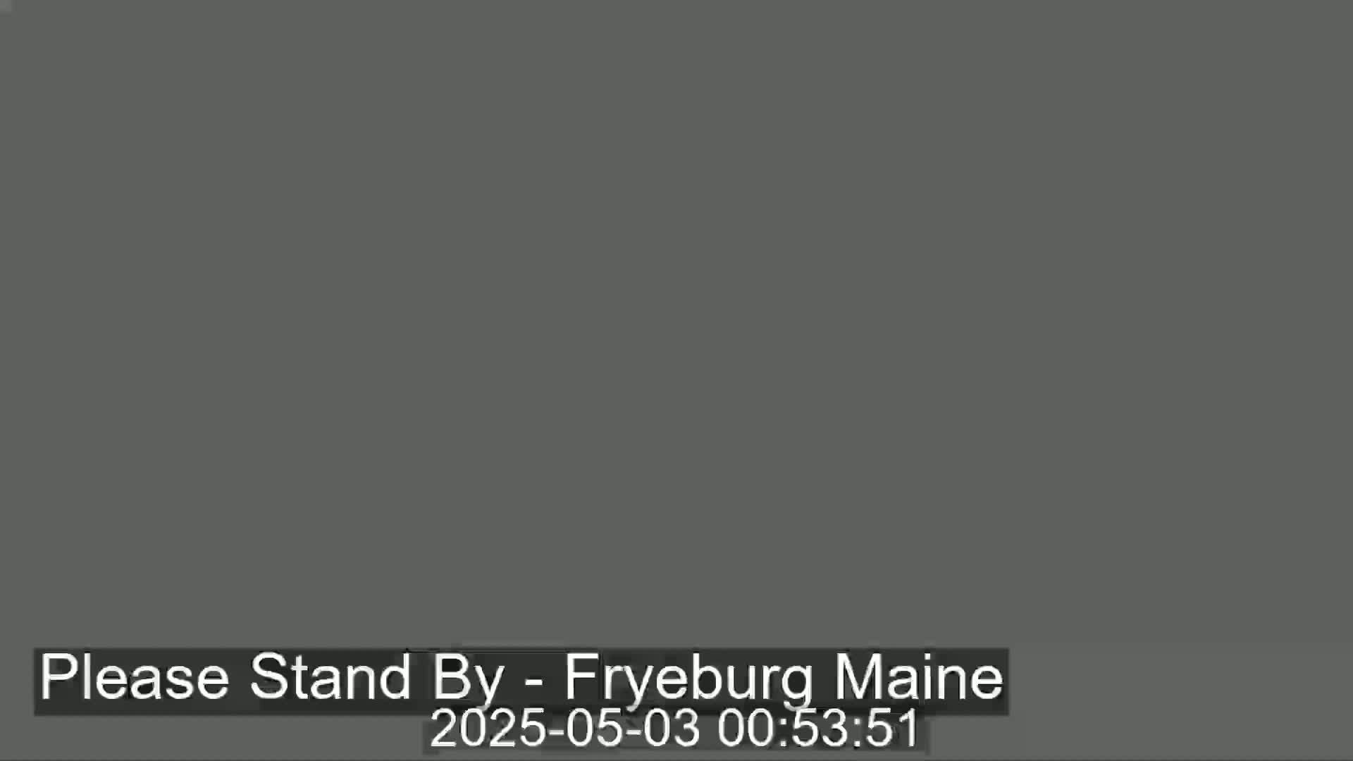 The image shows a solid dark gray screen.