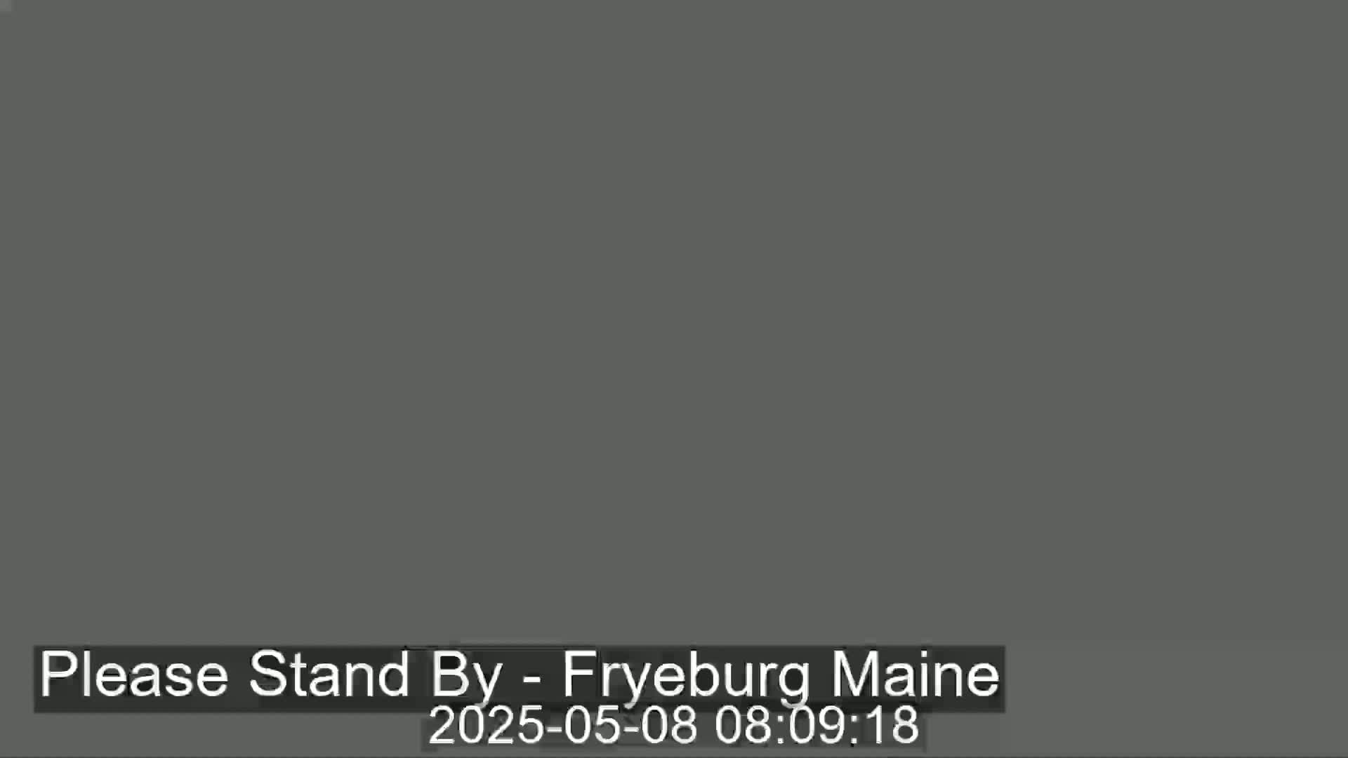 A solid dark gray screen is displayed.