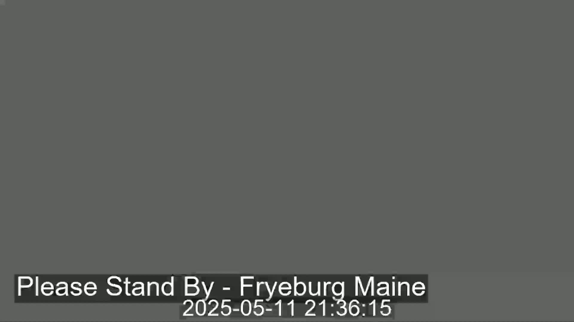 The image shows a solid, dark gray screen.