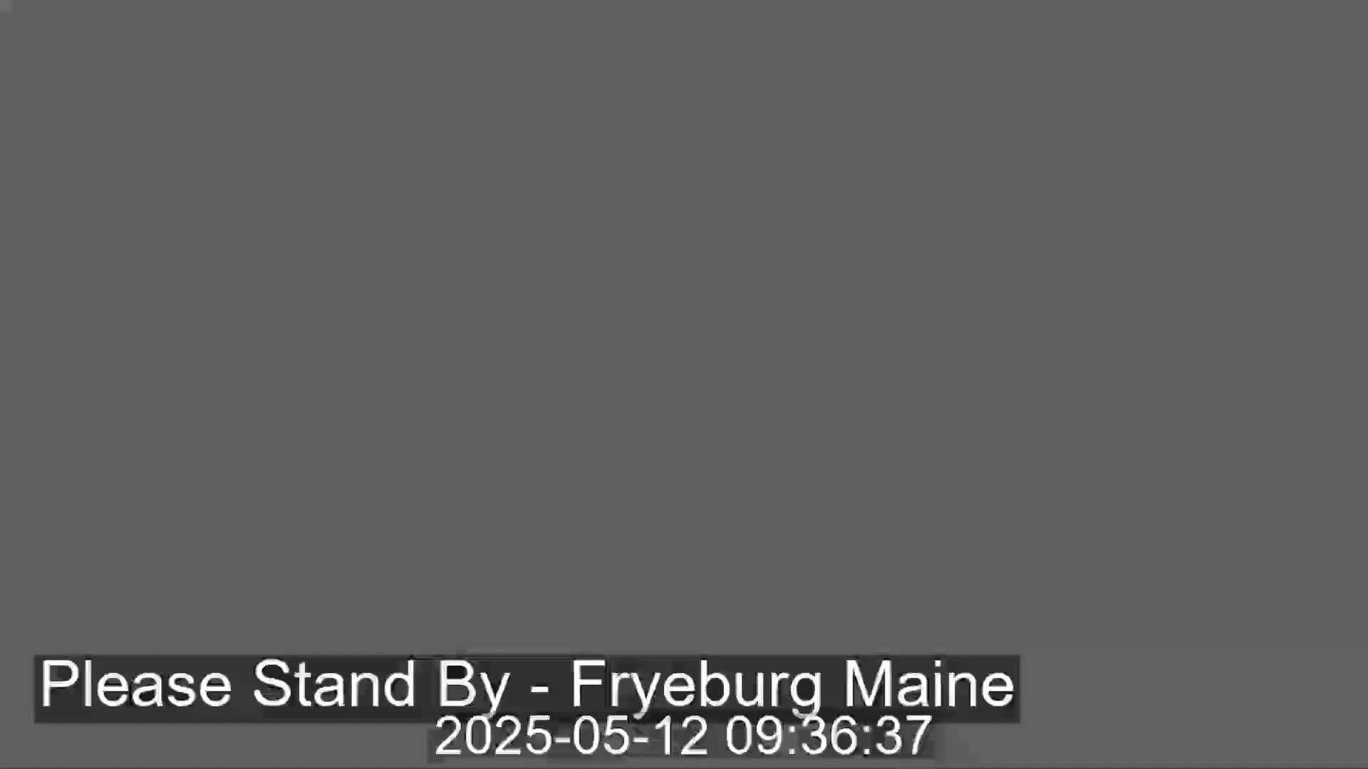 The image is a solid dark gray screen.