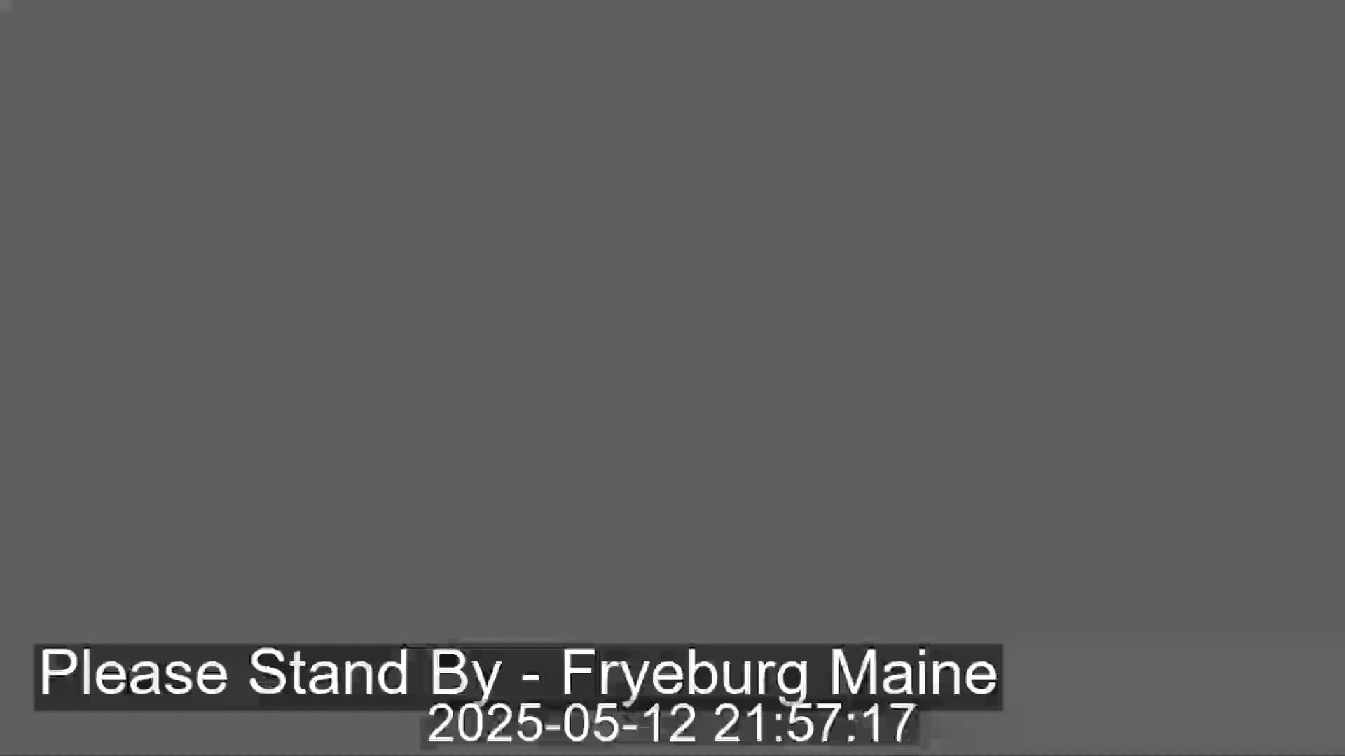 The image shows a solid dark gray screen.