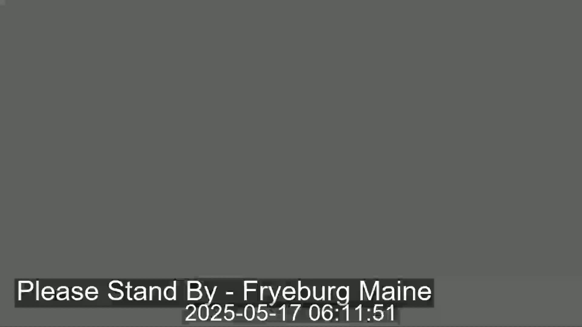 The image is a solid dark gray screen.