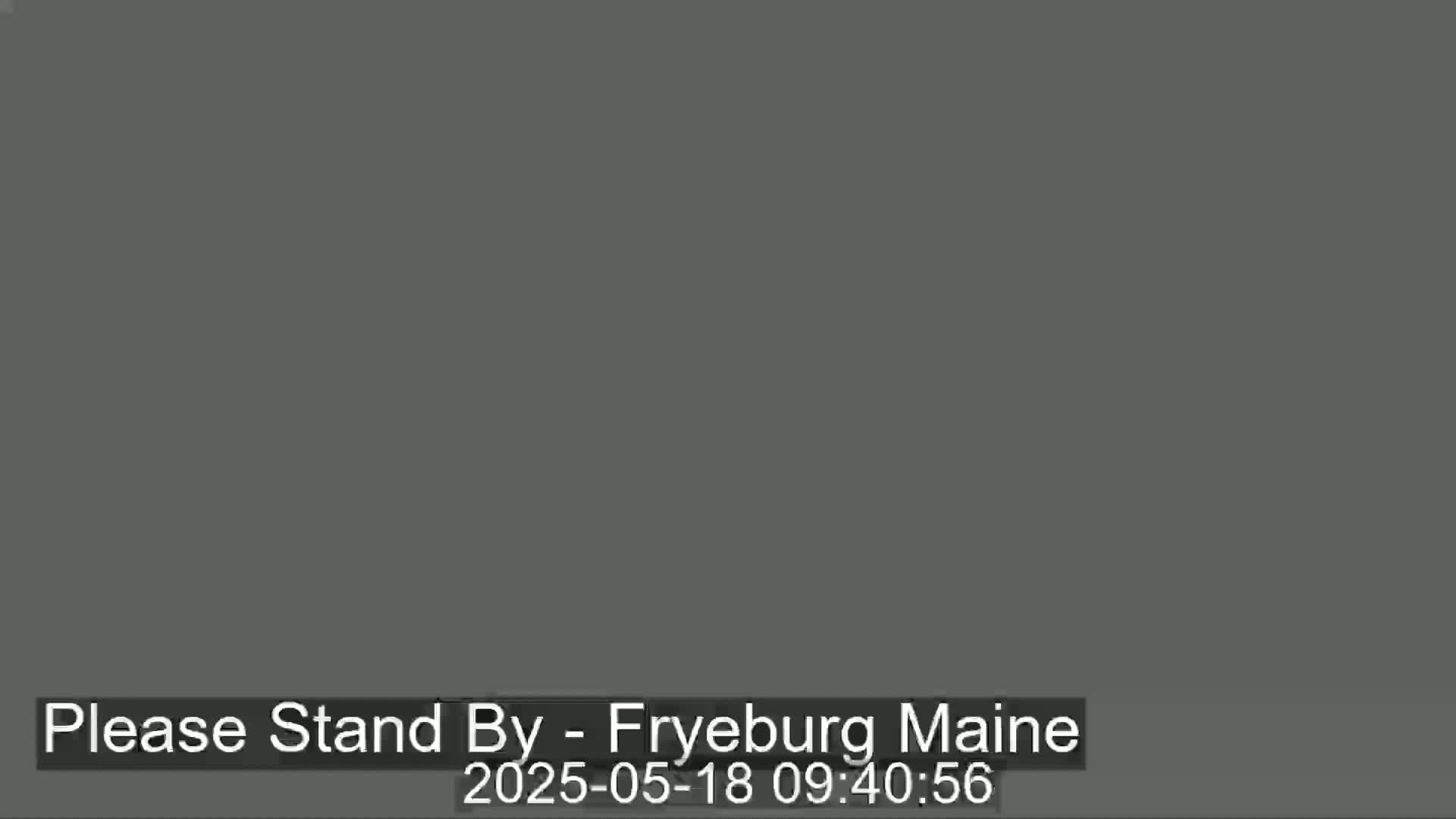 The image shows a solid dark gray screen.