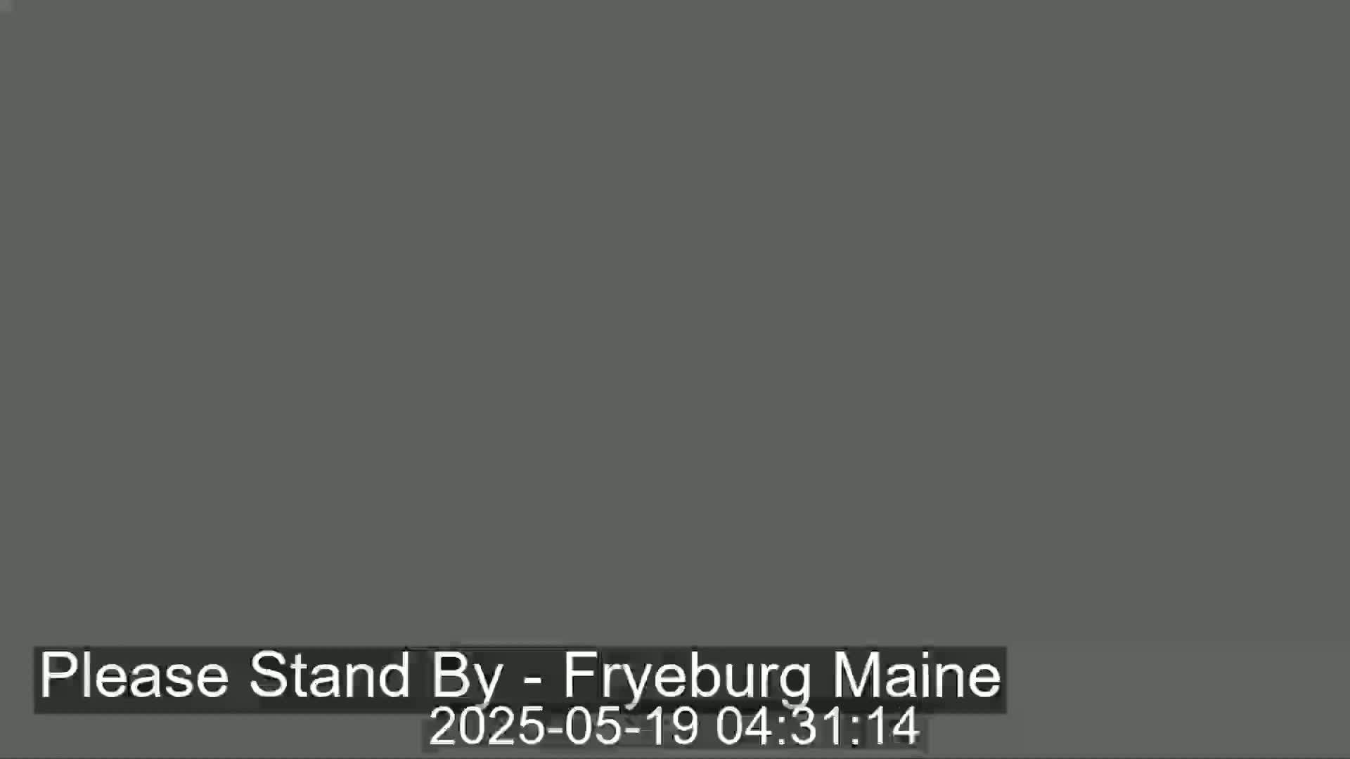 The image is a solid dark gray screen.
