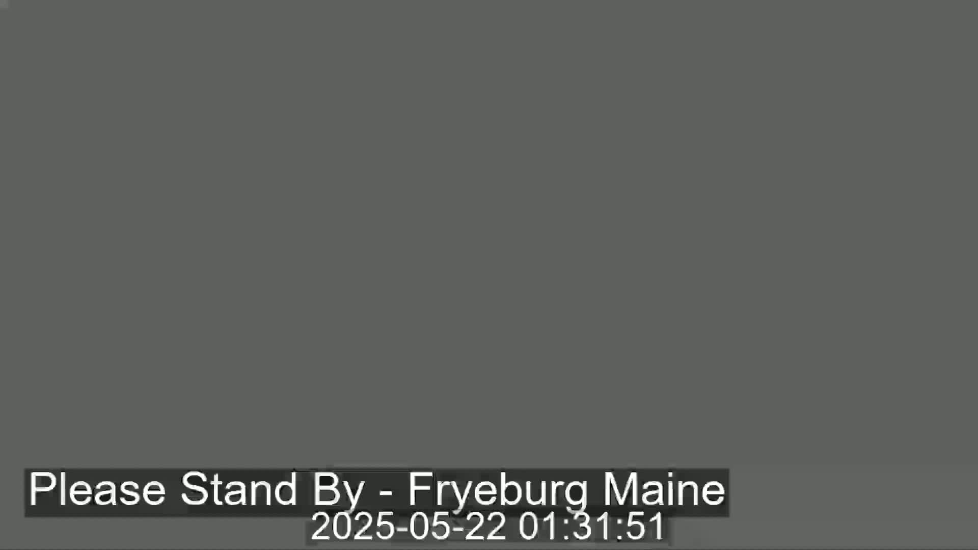 The image shows a solid, dark gray screen.
