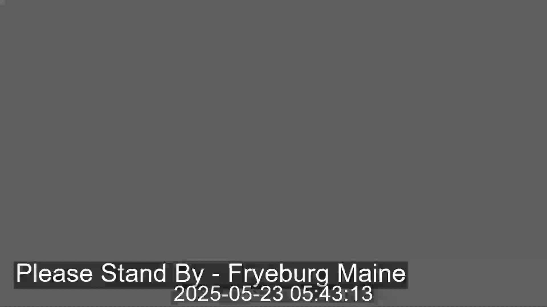 The image shows a solid dark gray screen.