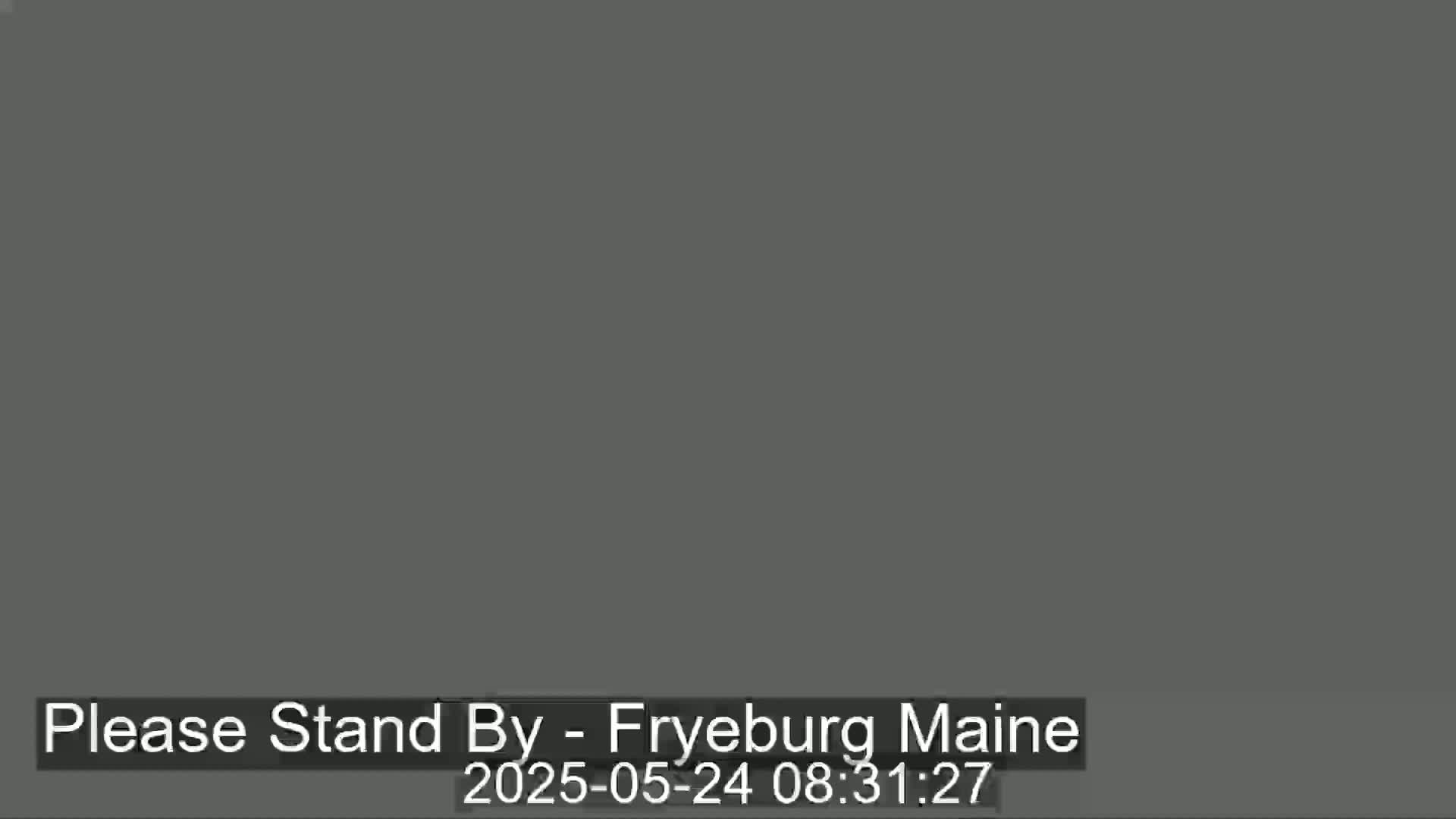 The image shows a solid dark gray screen.