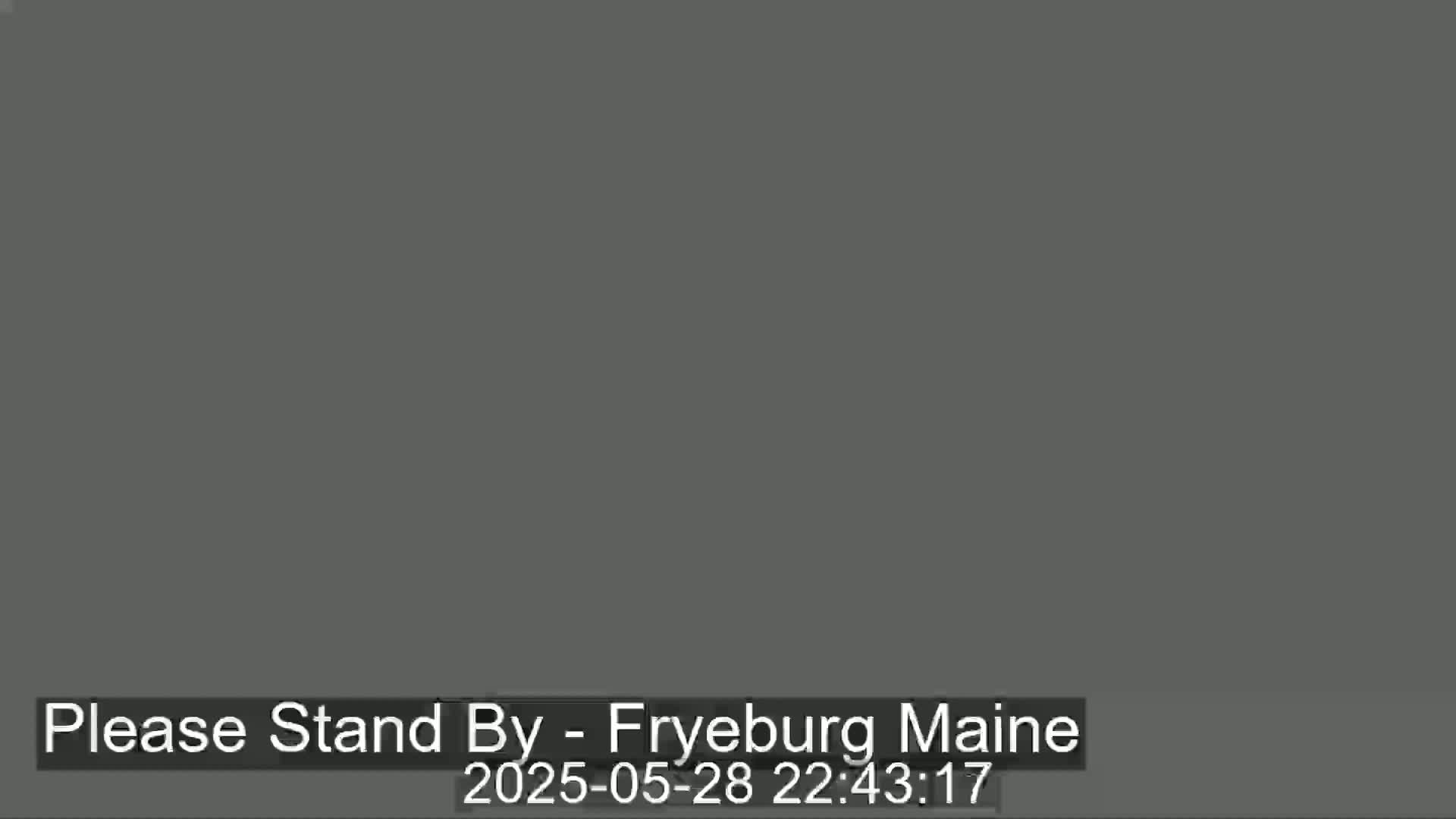 The image shows a solid dark gray screen.
