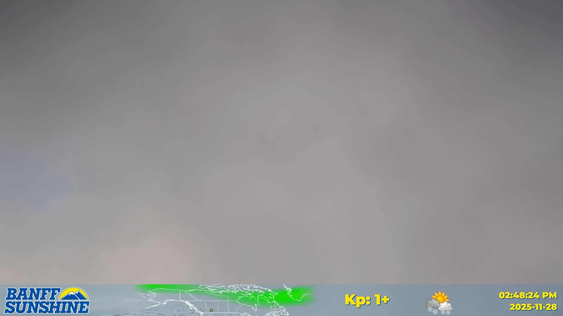 The outdoor scene is completely obscured by dense, uniform grey overcast or foggy conditions.