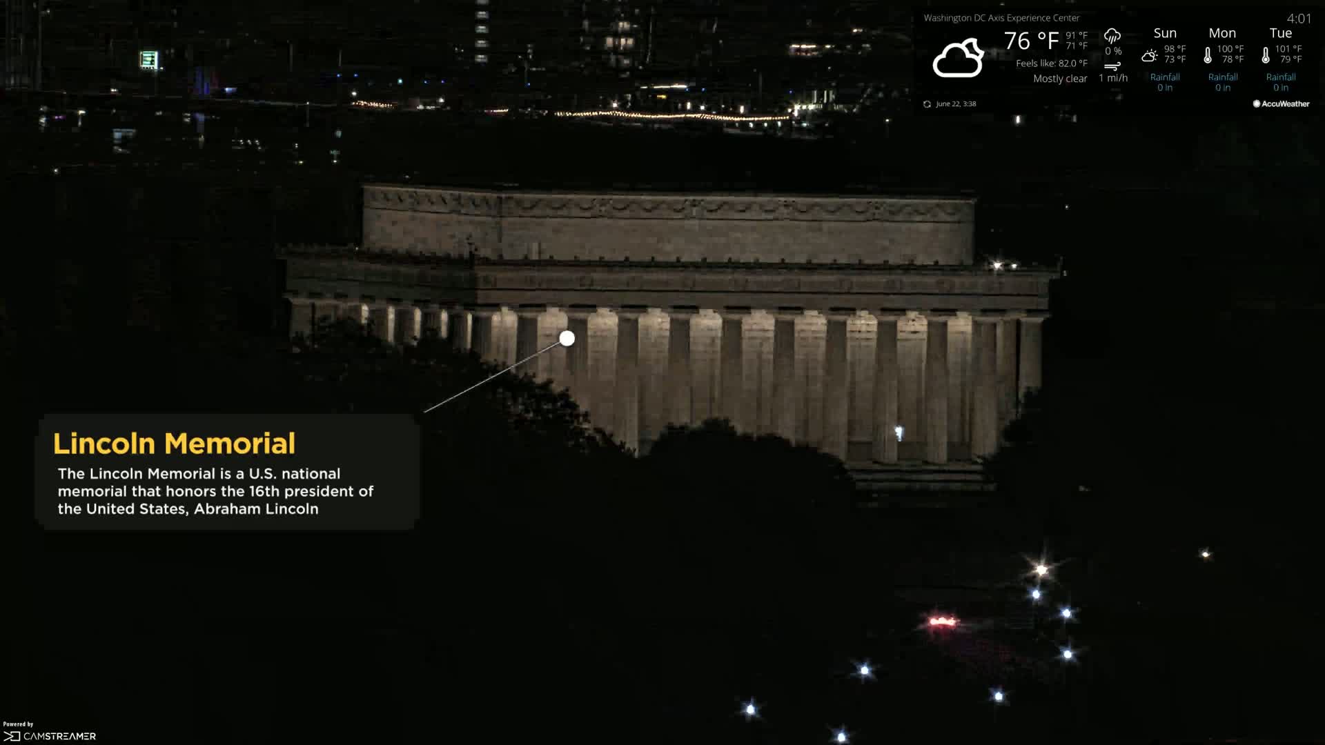 The Lincoln Memorial is illuminated at night under mostly clear skies.