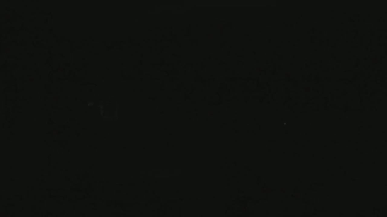 The image is entirely black, possibly depicting nighttime.