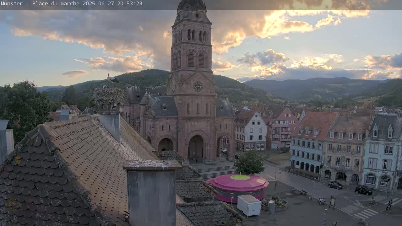 Munster,Place du Marché ( Market Square) & La Fontaine Lion Fountain / Église protestante (Protestant Church) Live Cam -  Colmar-Ribeauvillé, Haut-Rhin, Grand Est, France