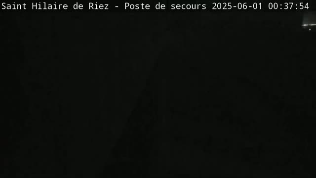 The image shows a completely dark scene at night.