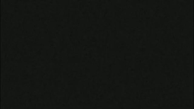 The image is a solid dark-gray or black field.