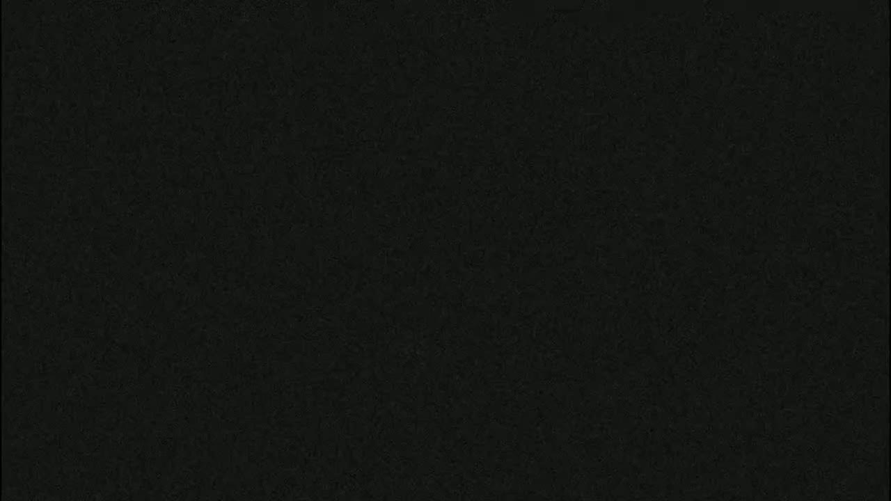 The image is a solid dark-grey texture.