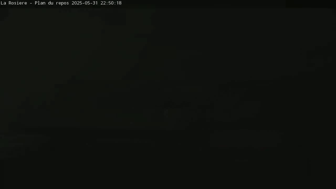The image is almost entirely black, suggesting nighttime or very low light conditions.