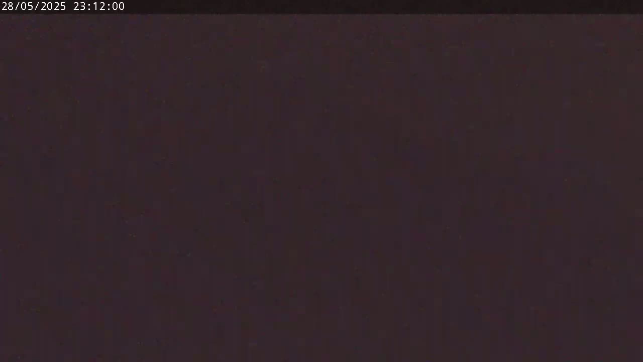 The image shows a dark, uniformly colored surface.