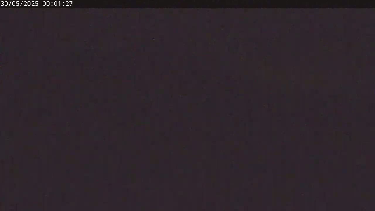 The image shows a completely dark, almost black screen.