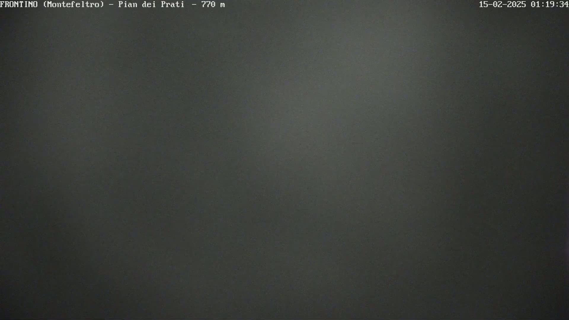 A dark gray, uniformly textured surface fills the entire frame.