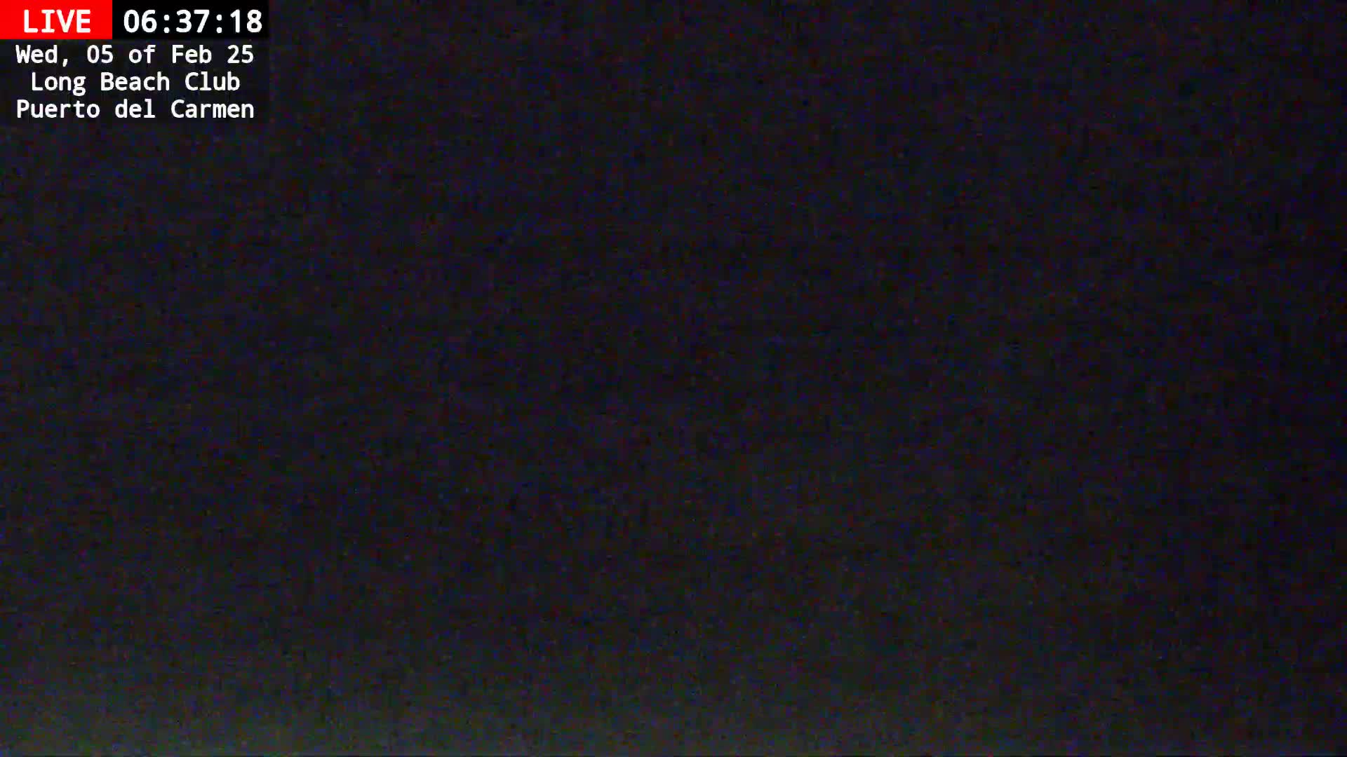The image shows a dark, mostly black screen, possibly due to nighttime or poor lighting conditions.