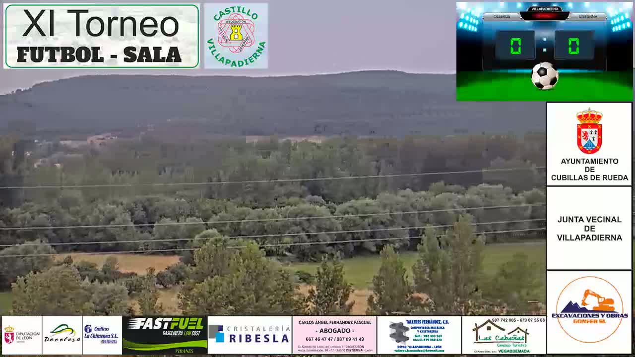 A long shot of a verdant valley with a hill in the background under a cloudy sky.