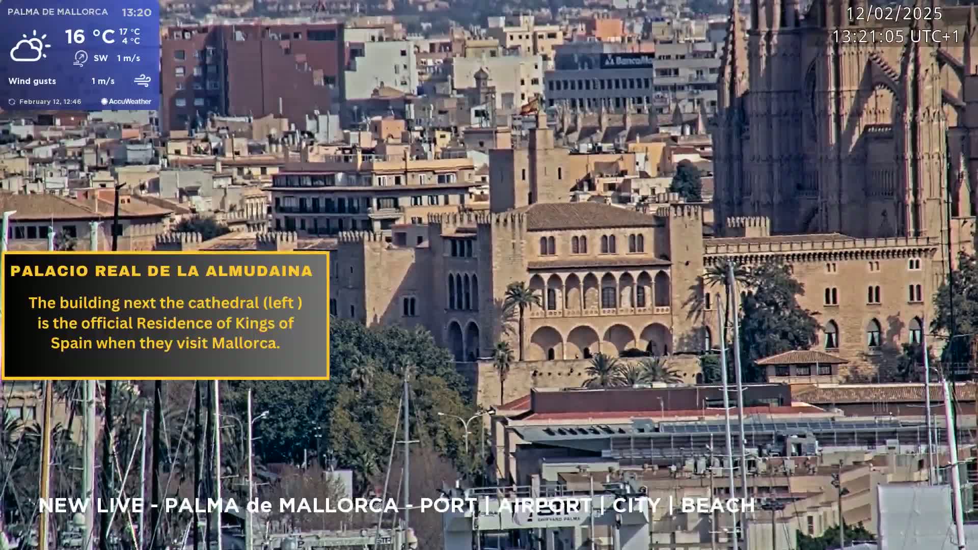 A partly sunny view of a city, showing a large palace next to a cathedral, with boats in a harbor in the foreground.