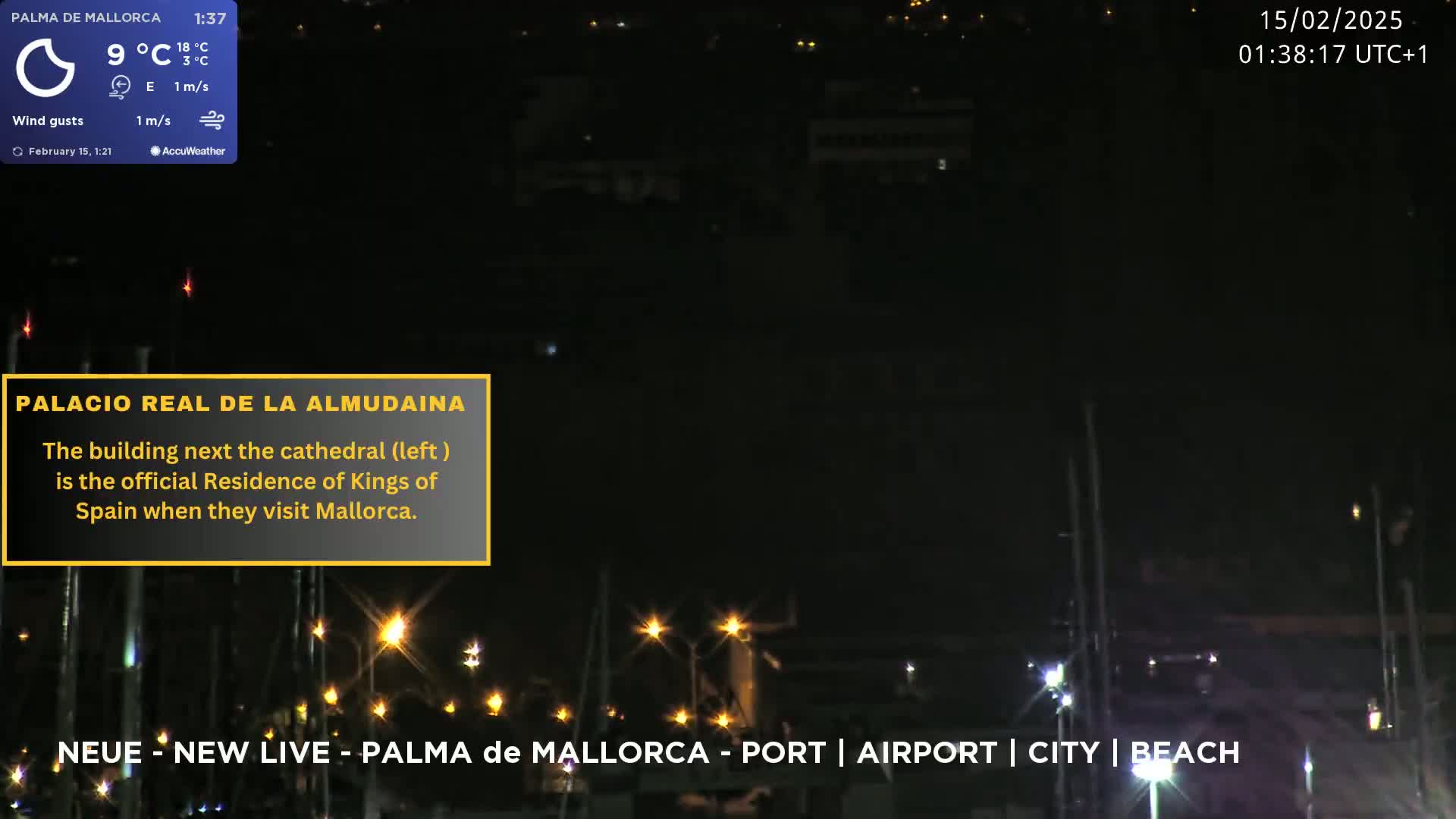 A nighttime view of a harbor with dimly lit boats and buildings under a clear sky, with a calm easterly wind at 1 m/s and a temperature of 9°C.
