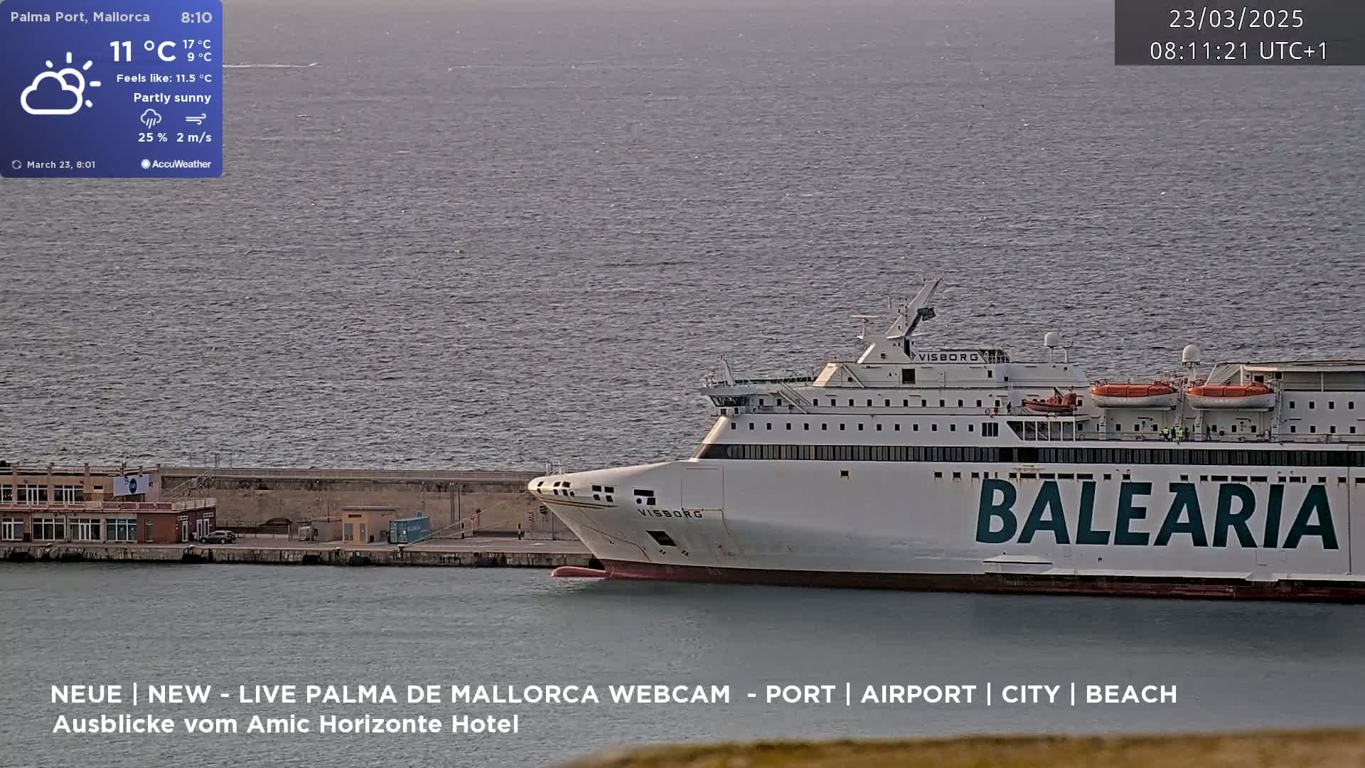 A large ferry labeled "Balearia" is docked at a port on a partly sunny day with a light breeze.