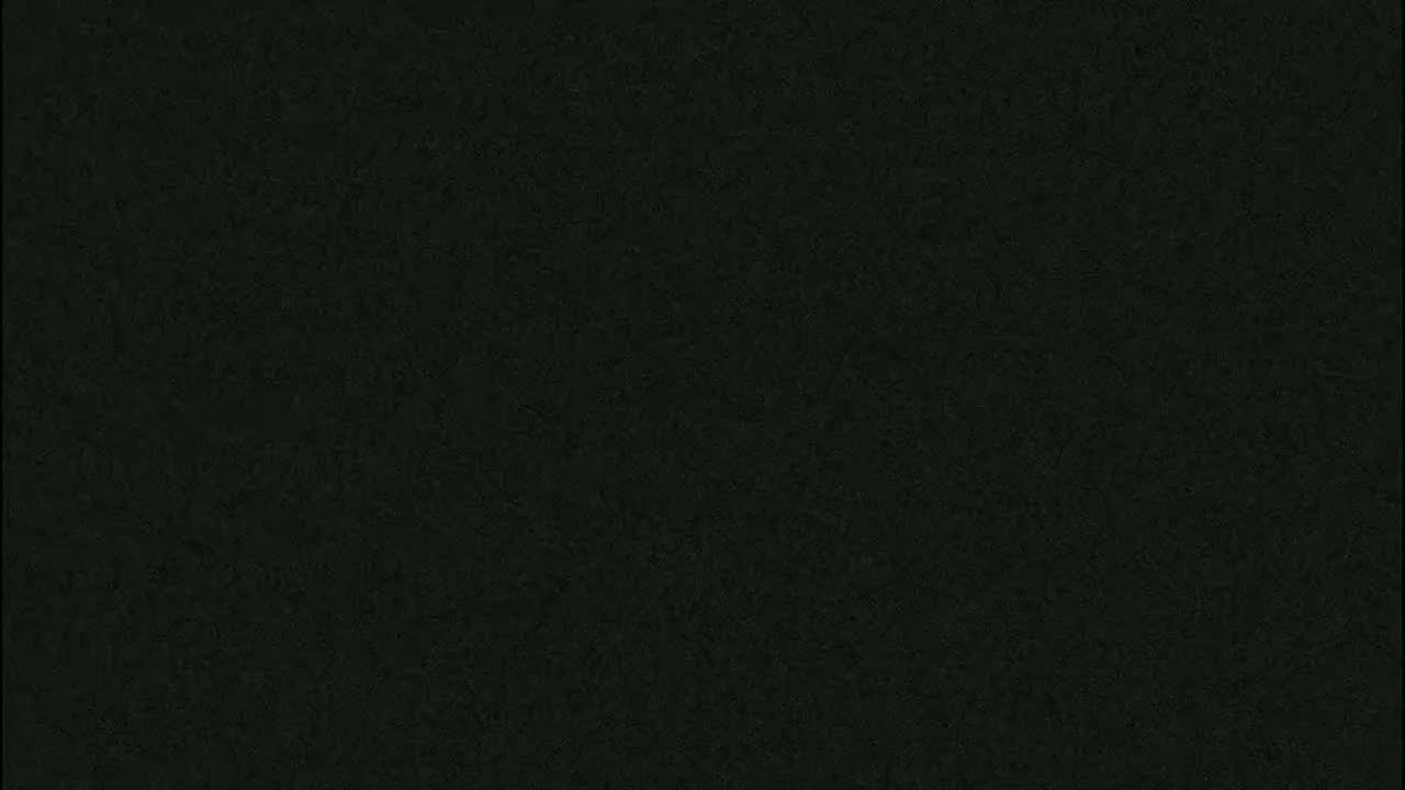 The image shows a uniformly dark gray textured surface.