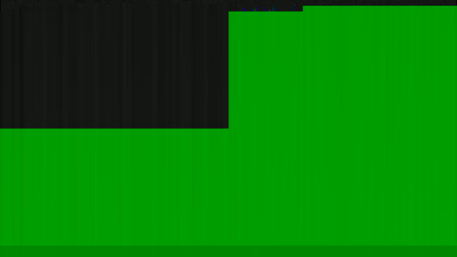 The image shows a mostly green surface with a smaller black area at the top left.