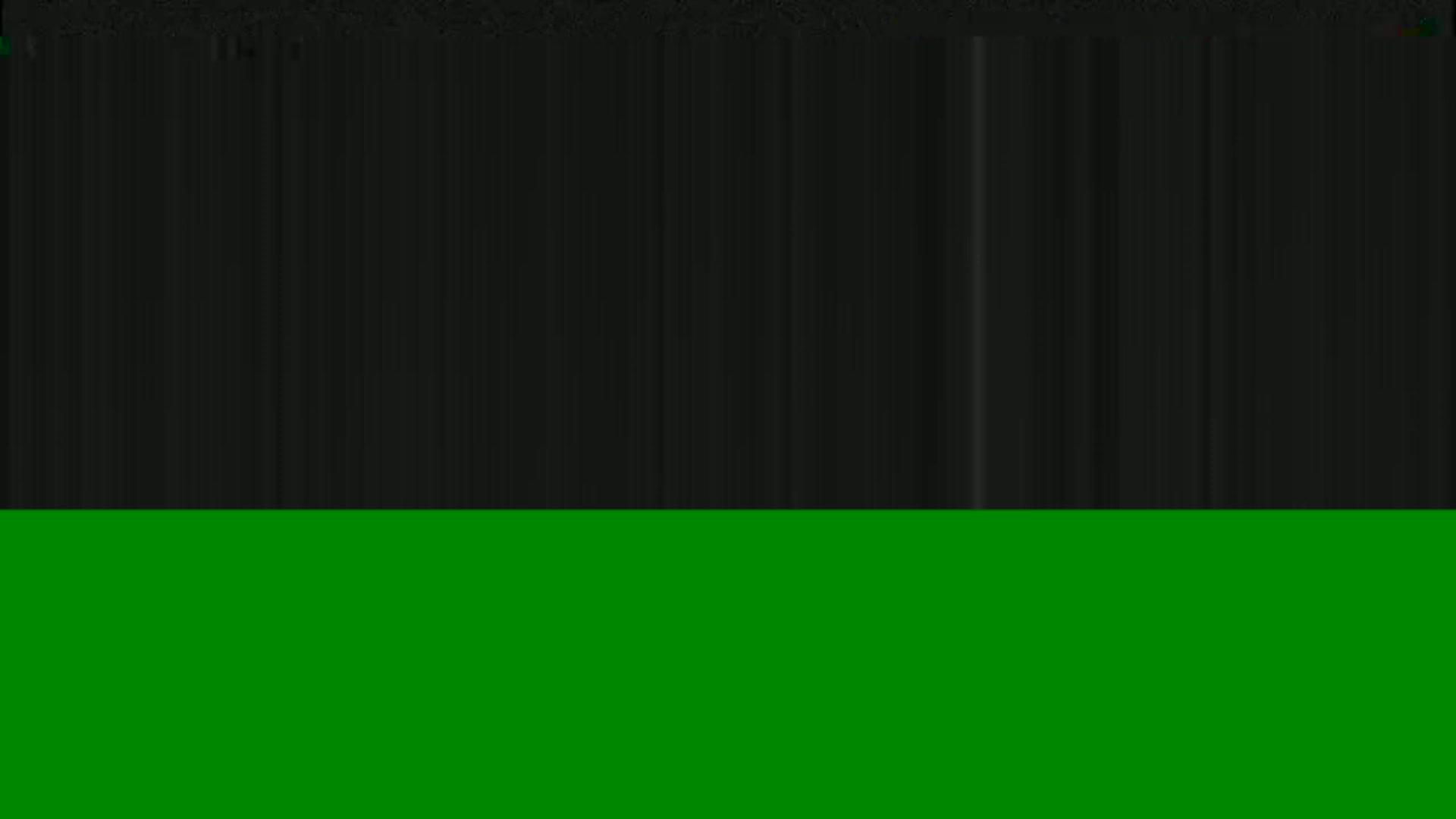 The image shows a dark gray top half and a bright green bottom half.