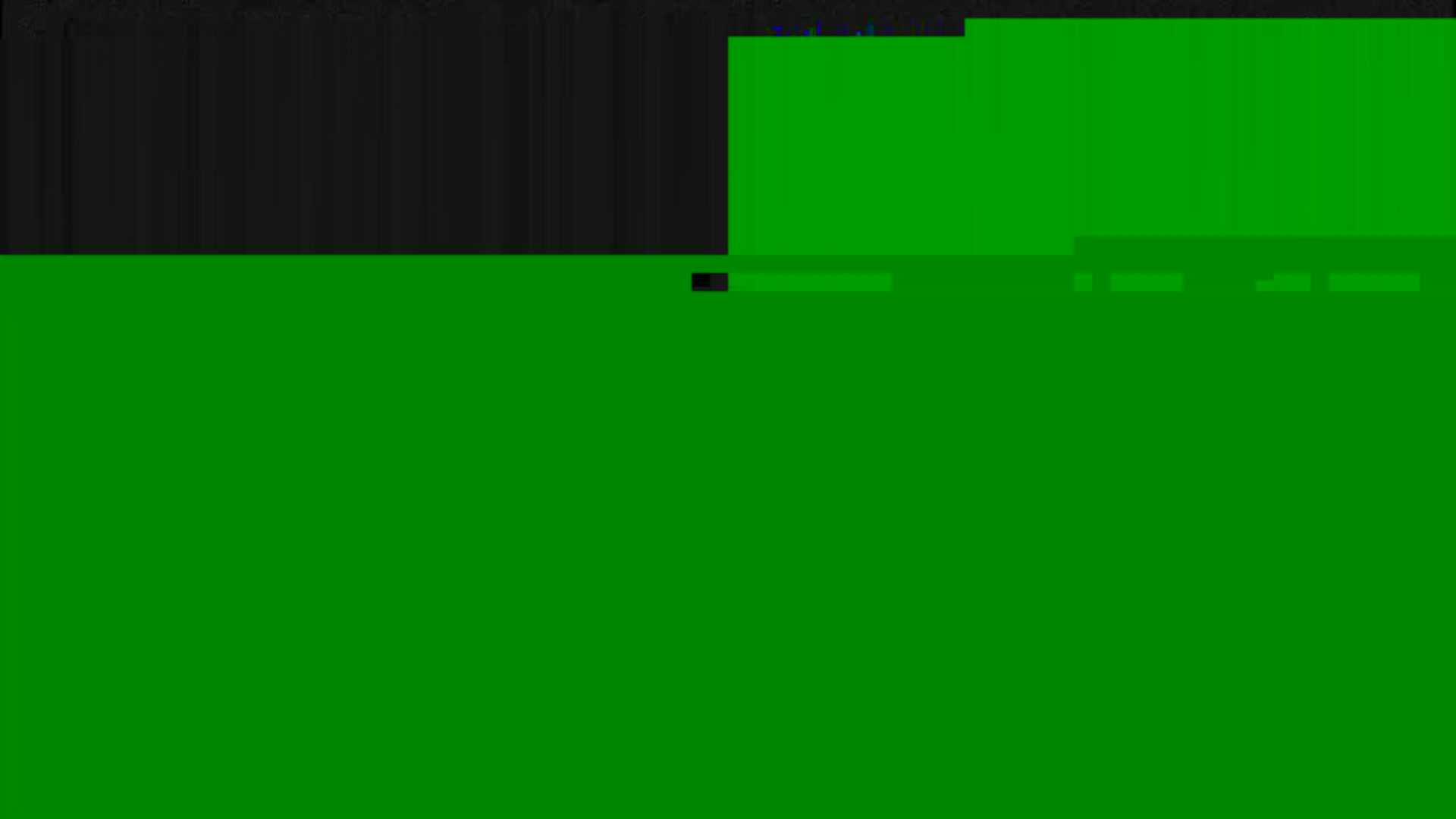 The image shows a mostly green screen with a small, dark area at the top and a few thin horizontal lines of different colors near the top right and middle.