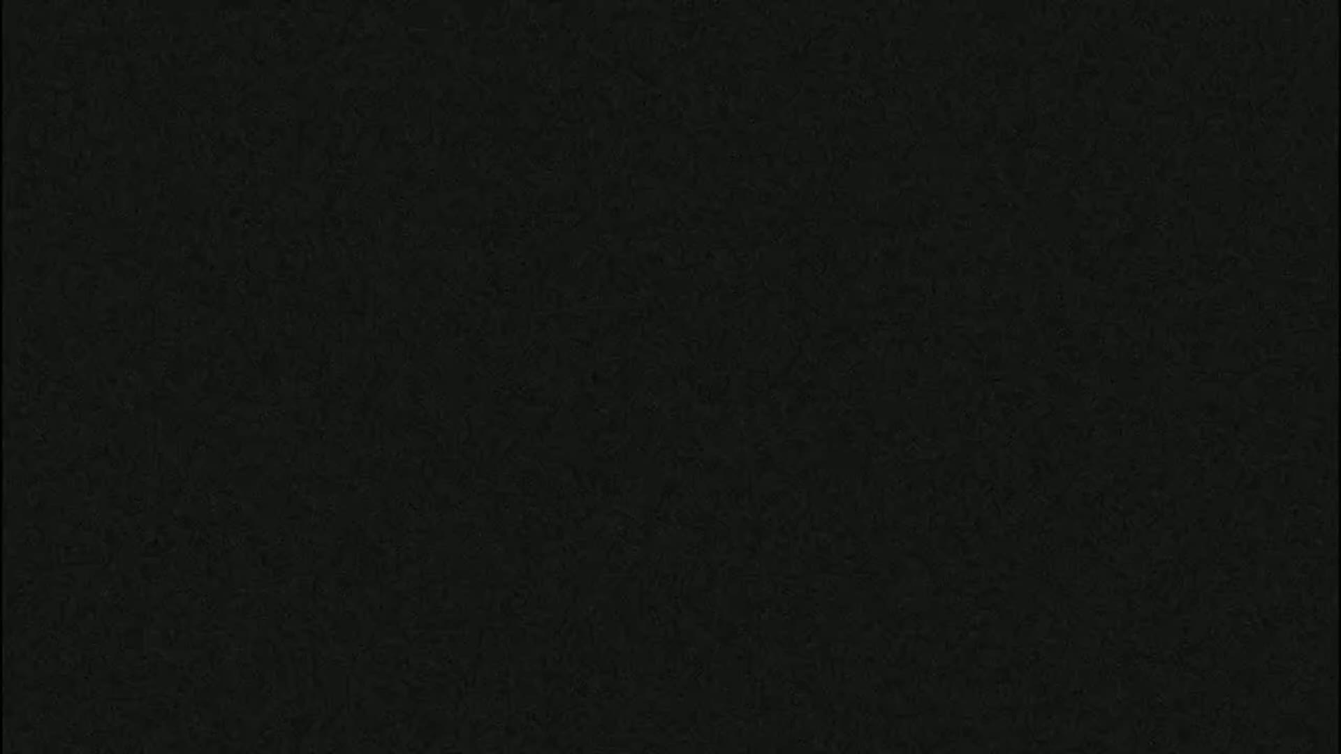 The image is a dark, textured background.