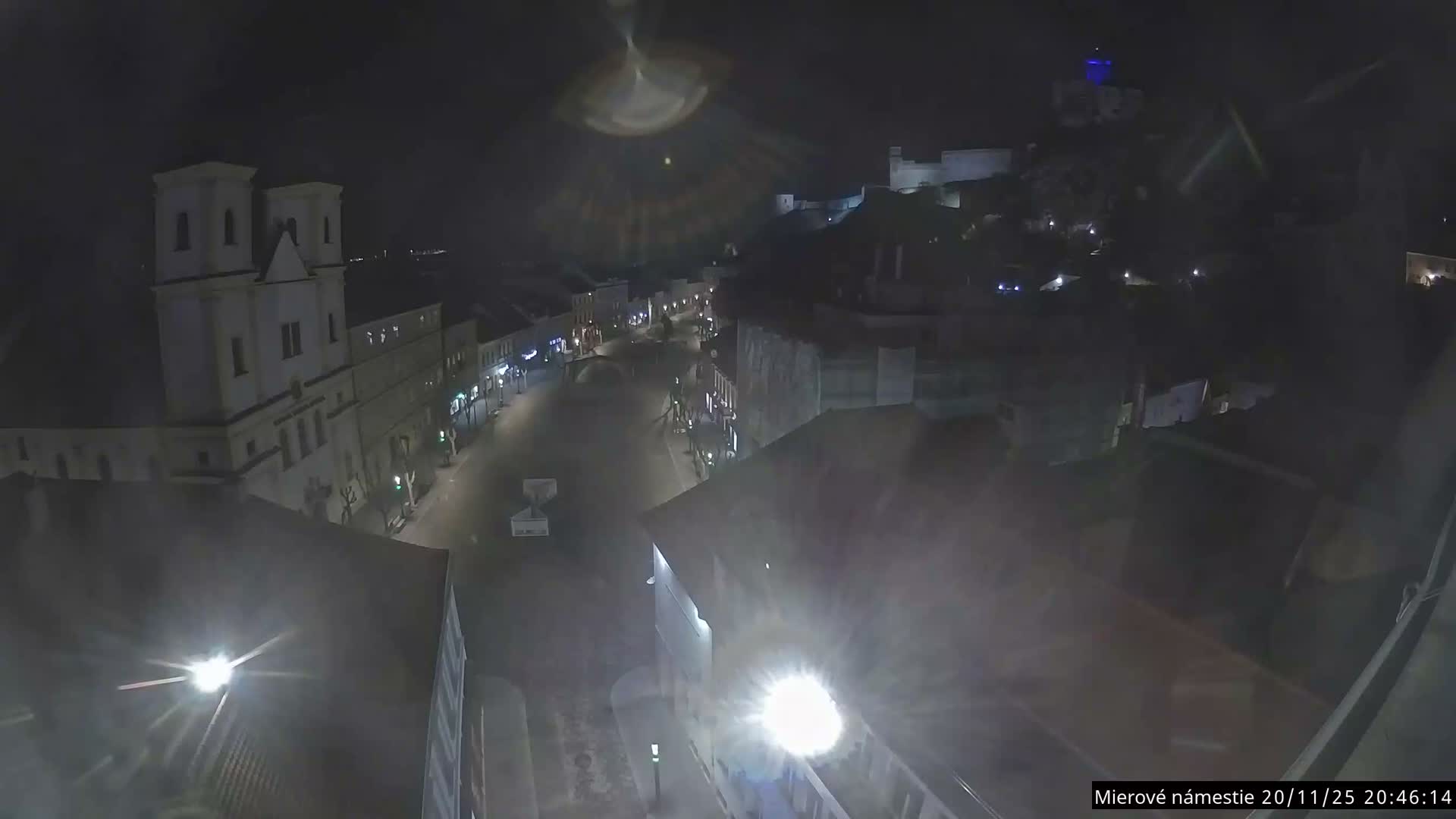 Trenčín, Piaristický kostol sv. Františka Xaverského Church & Trenciansky Hrad (Ttencin Castle) at Mierové námestie Square East View Live Cam - Trencin, Okres Trencin, Slovakia 