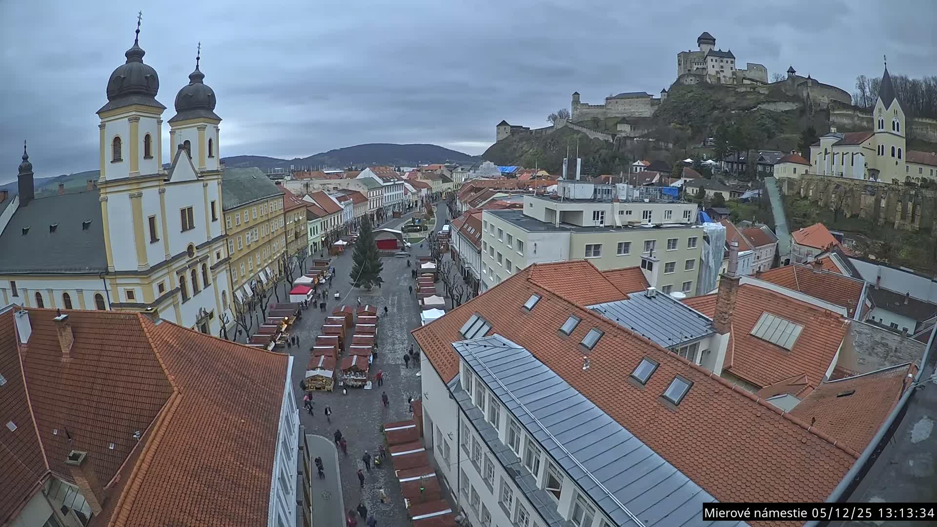 Trenčín, Piaristický kostol sv. Františka Xaverského Church & Trenciansky Hrad (Ttencin Castle) at Mierové námestie Square East View Live Cam - Trencin, Okres Trencin, Slovakia 