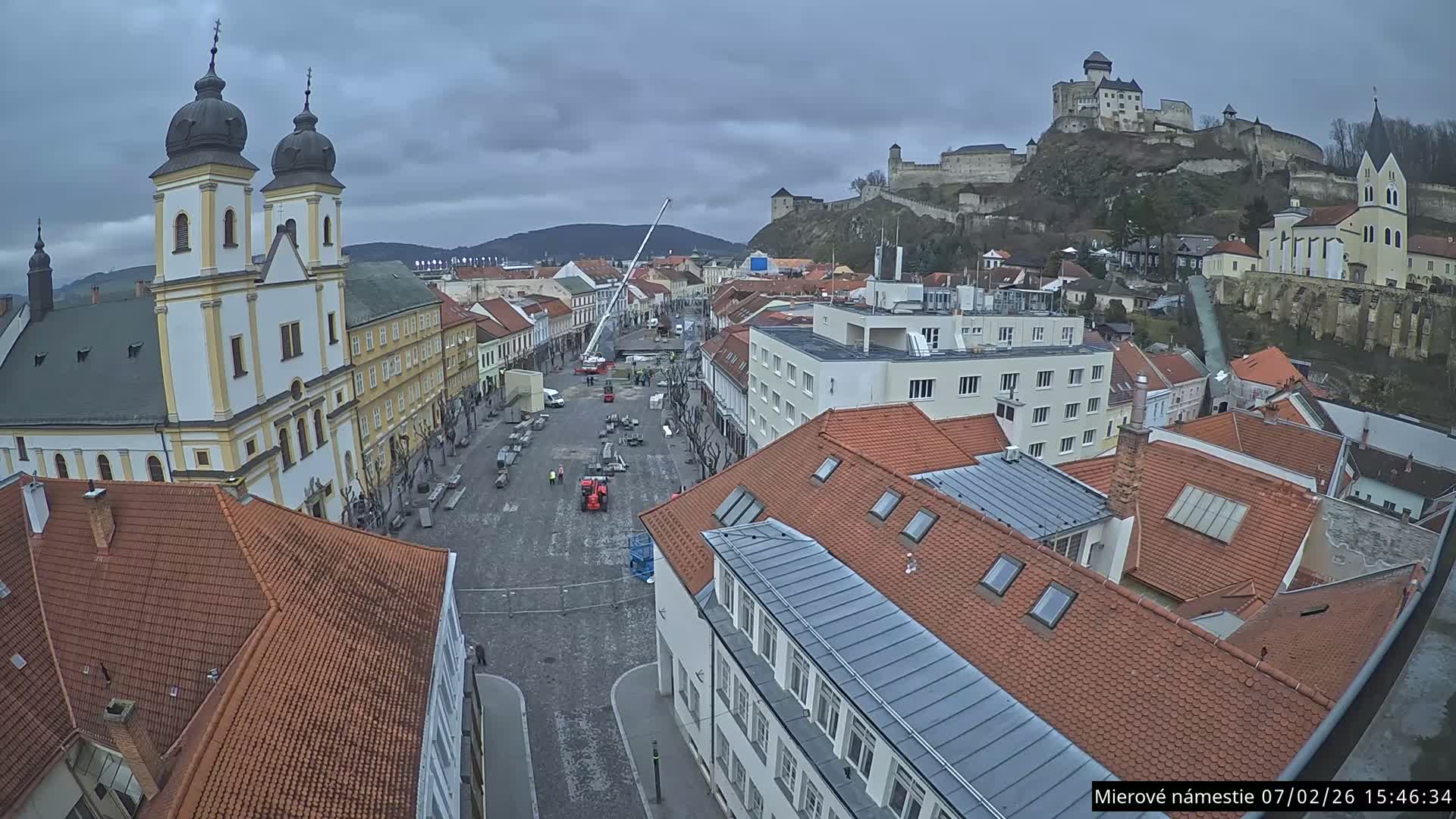 Trenčín, Piaristický kostol sv. Františka Xaverského Church & Trenciansky Hrad (Ttencin Castle) at Mierové námestie Square East View Live Cam - Trencin, Okres Trencin, Slovakia 