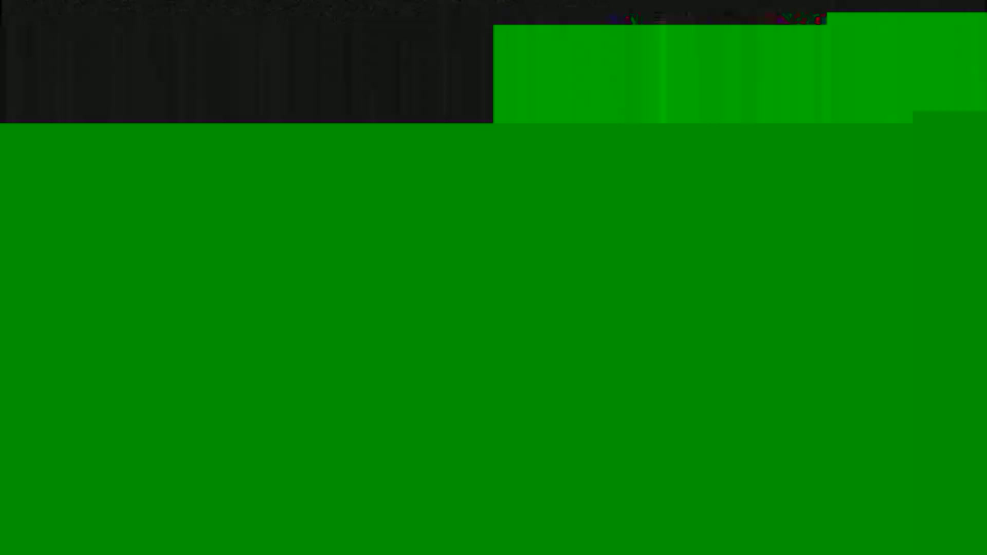 The image shows a mostly green screen with a small black section at the top.