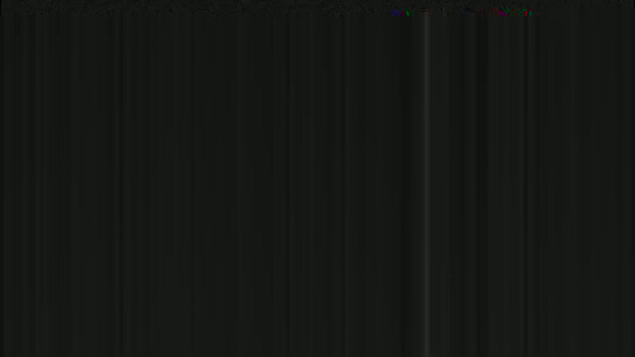The image shows a dark, vertically-striped pattern.