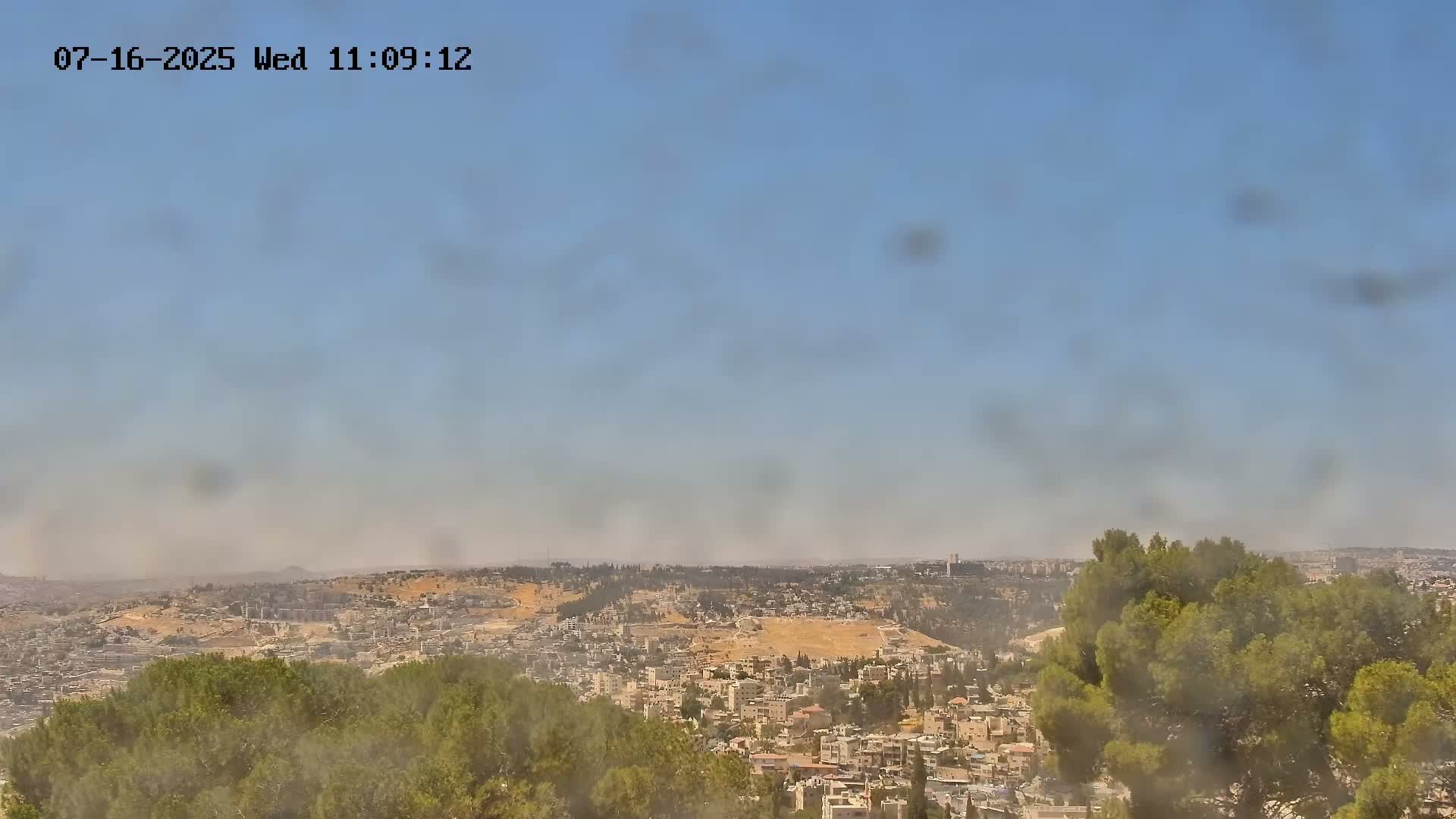 East Quds (Abu Dis/Jabel Mukaber/AlSawahira-AlGharbiyya/Sawahera al-Sharqiya/Jub al-Rum Towns View Towards Midbar Yehuda (Judean Desert) Live Cam - Jabal Batin Elhawa, East Quds, Palestine 