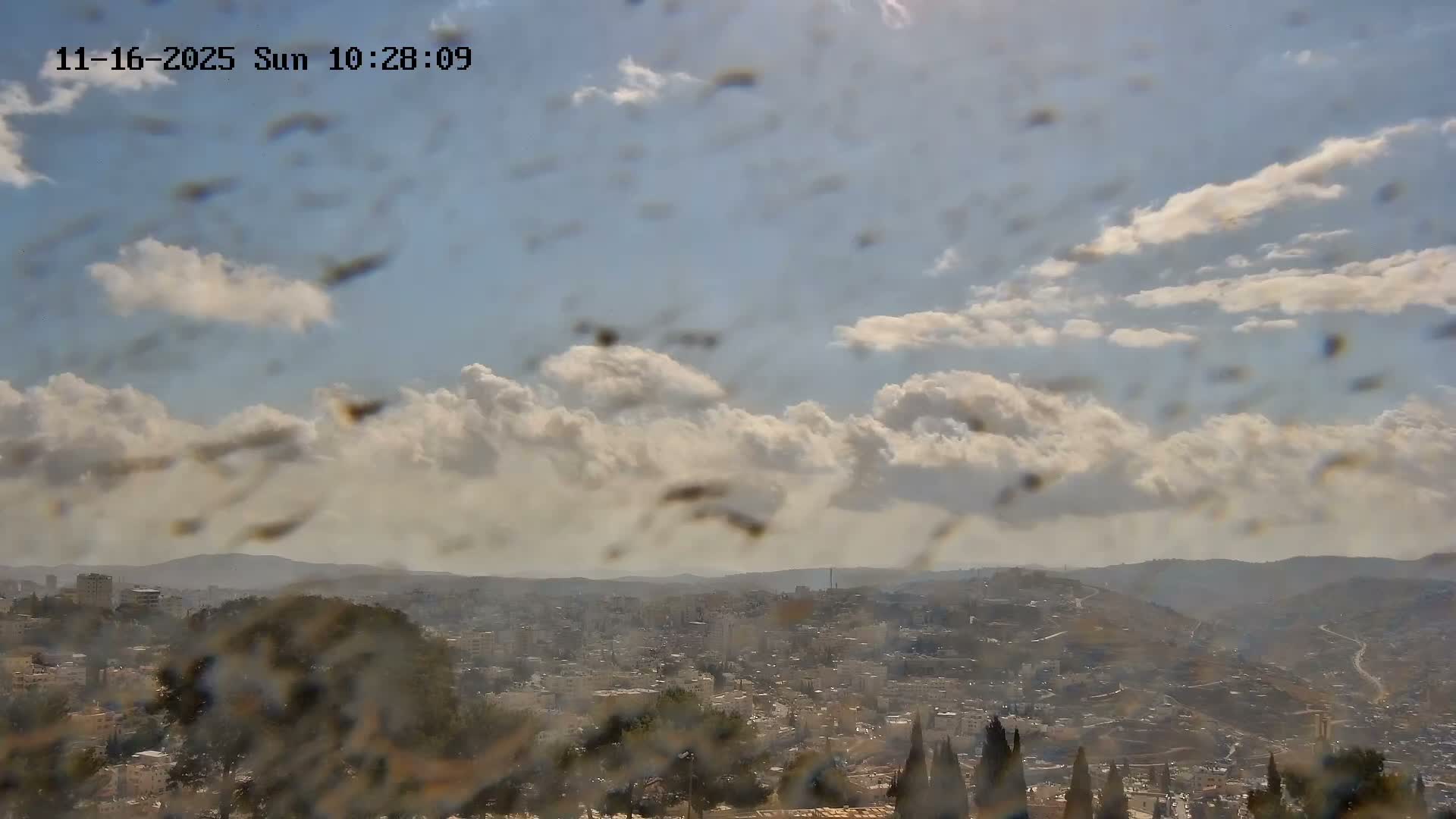 East Quds (Abu Dis/Jabel Mukaber/AlSawahira-AlGharbiyya/Sawahera al-Sharqiya/Jub al-Rum Towns View Towards Midbar Yehuda (Judean Desert) Live Cam - Jabal Batin Elhawa, East Quds, Palestine 
