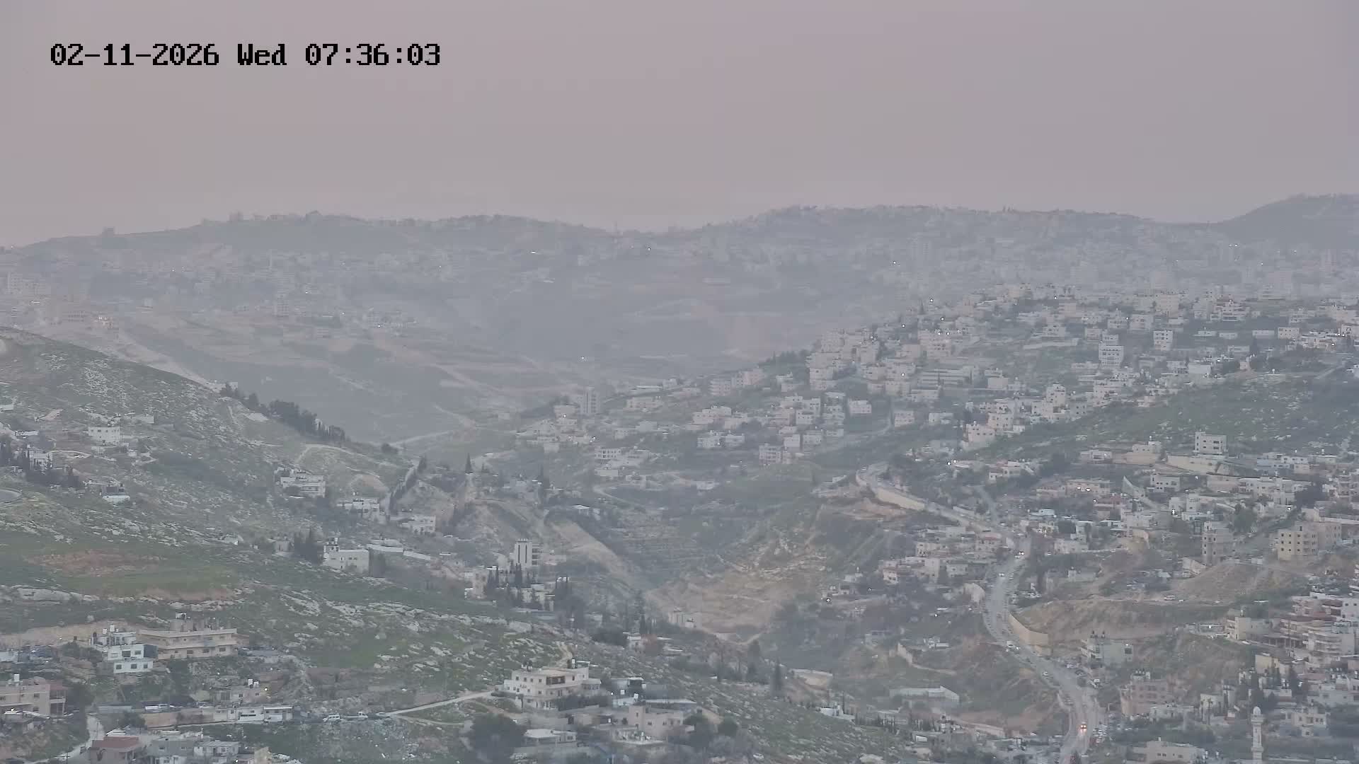 East Quds (Abu Dis/Jabel Mukaber/AlSawahira-AlGharbiyya/Sawahera al-Sharqiya/Jub al-Rum Towns View Towards Midbar Yehuda (Judean Desert) Live Cam - Jabal Batin Elhawa, East Quds, Palestine 