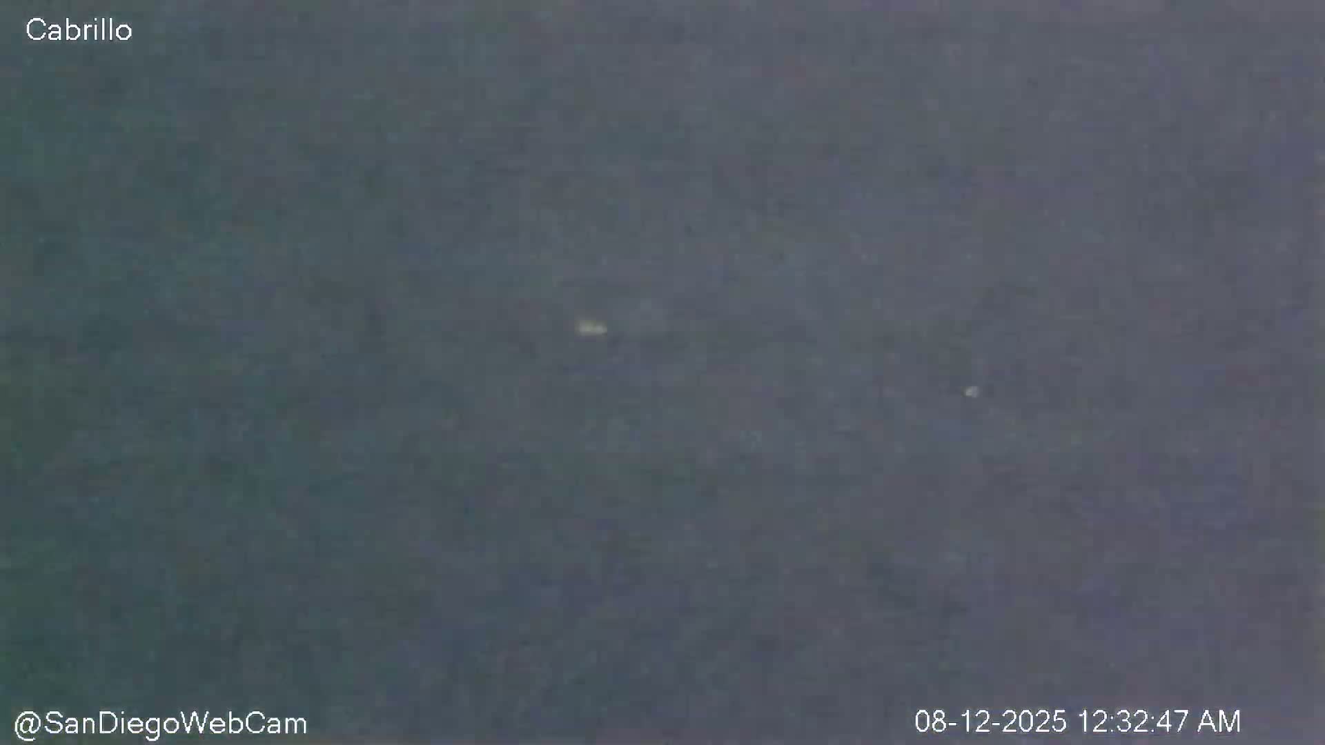A dark, overcast sky is visible.
