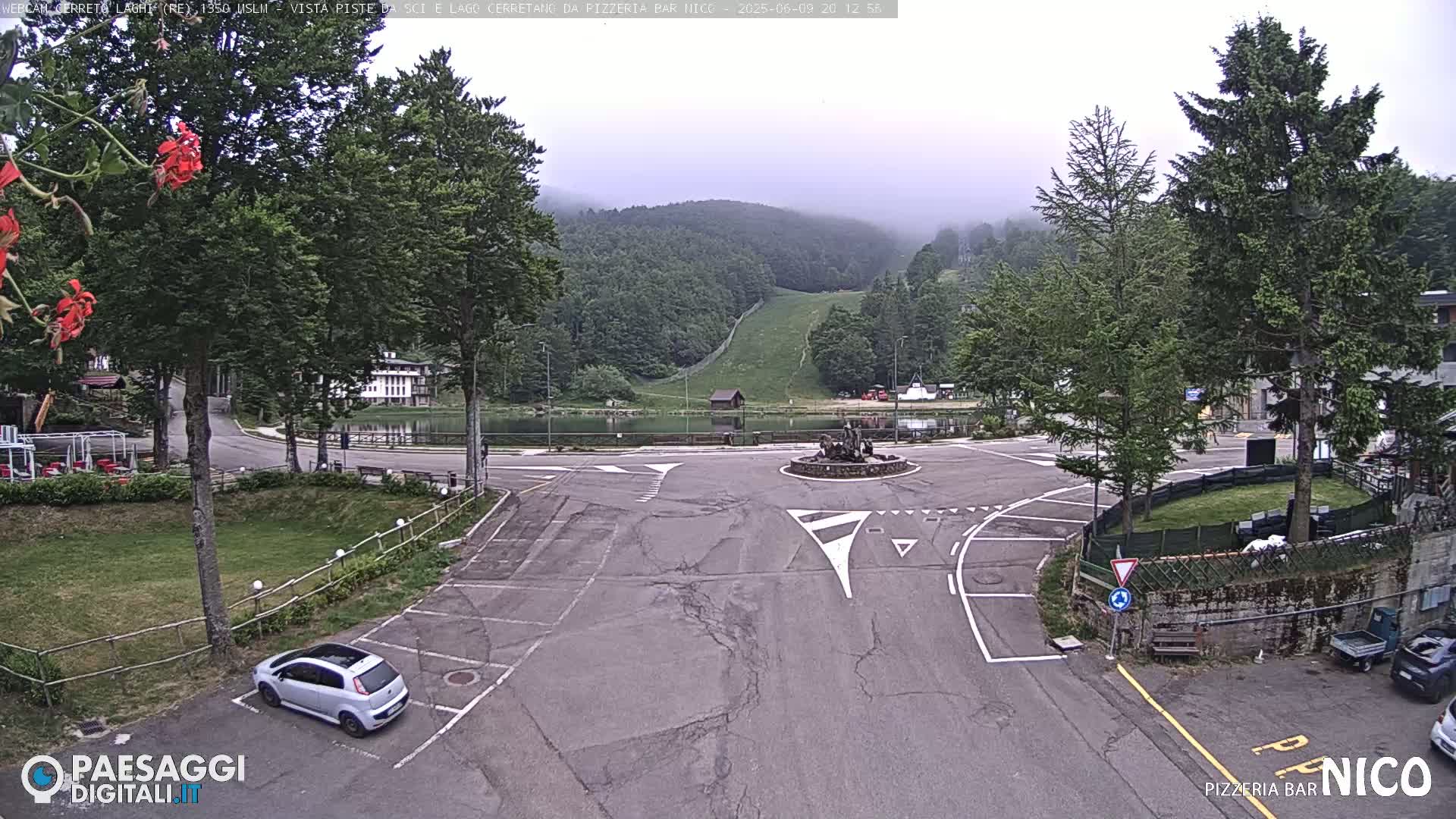  Cerreto Laghi Lake Ski Slopes & Lake's Square Live Cam  - Reggio Emilia, Emilia-Romagna, Italy