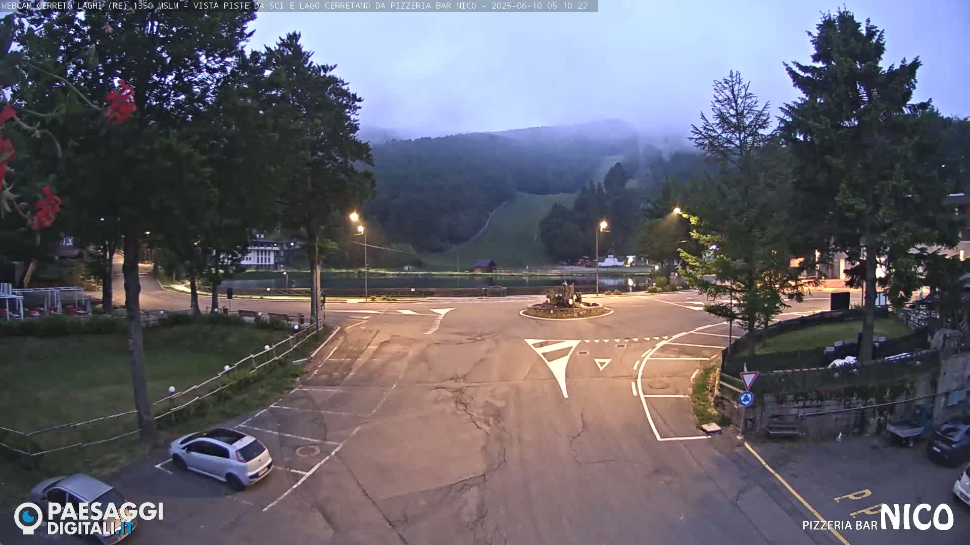  Cerreto Laghi Lake Ski Slopes & Lake's Square Live Cam  - Reggio Emilia, Emilia-Romagna, Italy