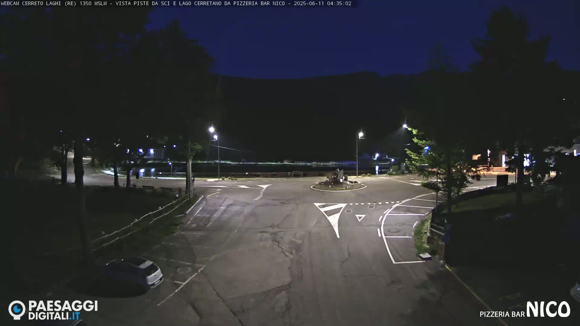  Cerreto Laghi Lake Ski Slopes & Lake's Square Live Cam  - Reggio Emilia, Emilia-Romagna, Italy